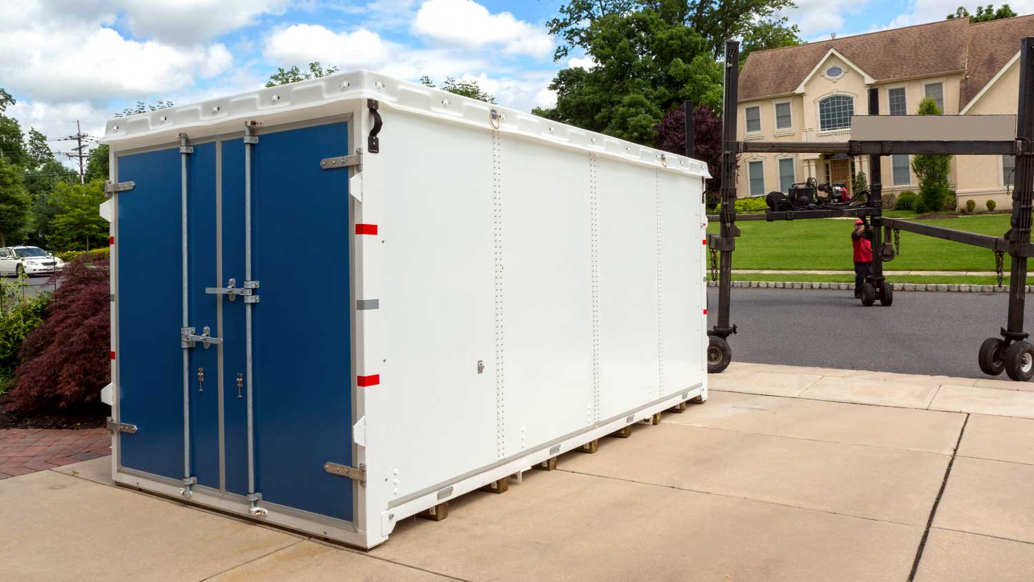 box-pods PODS container in a home driveway — Too Good Movers loads and unloads PODS in Las Vegas